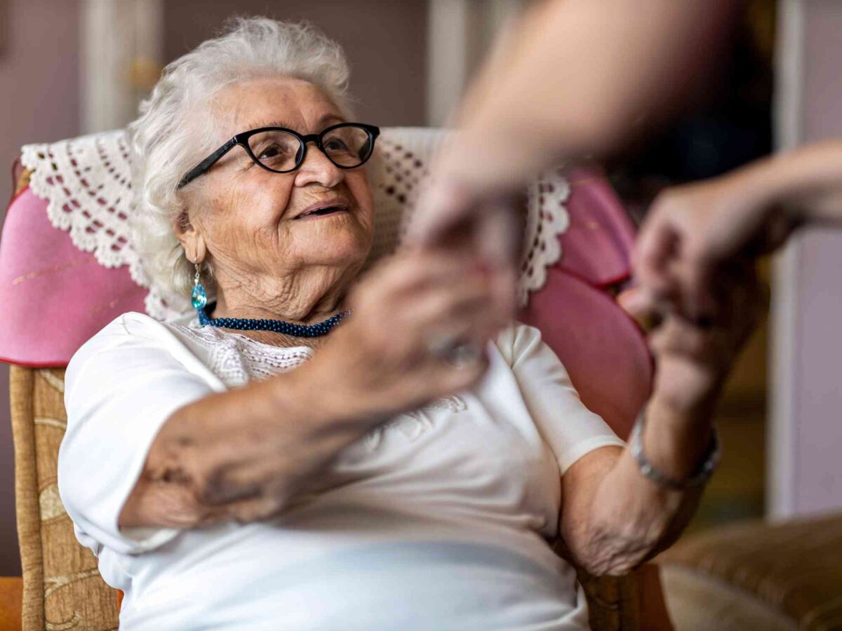 Senior getting a helping hand