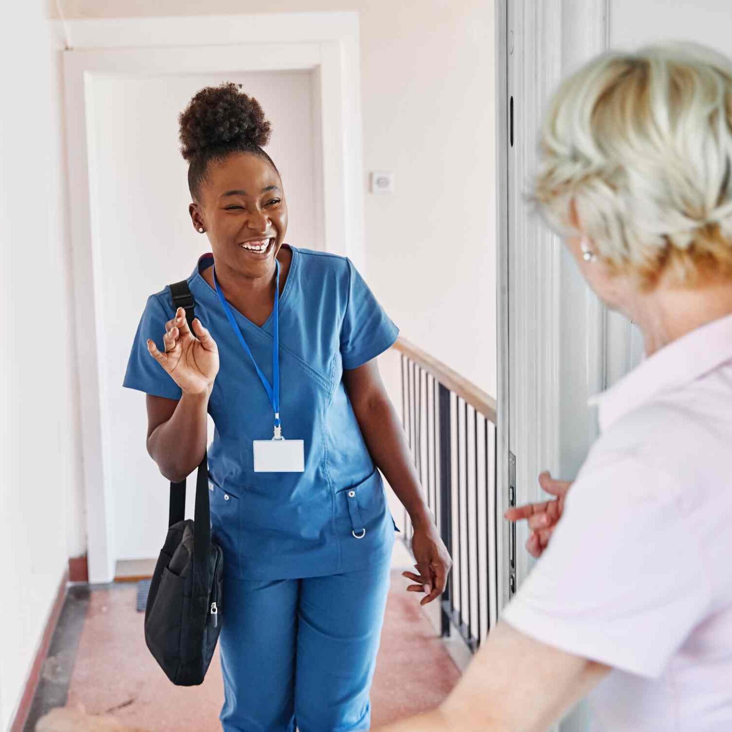 home health aide helping a senior