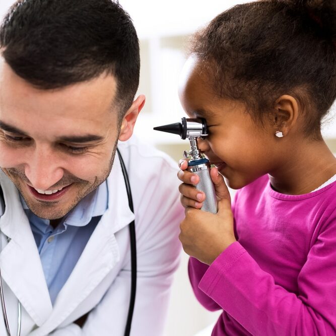 Doctor,Otologist,Palying,With,His,Patient,Using,Otoscope